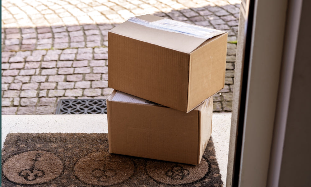 Two cardboard boxes stacked...