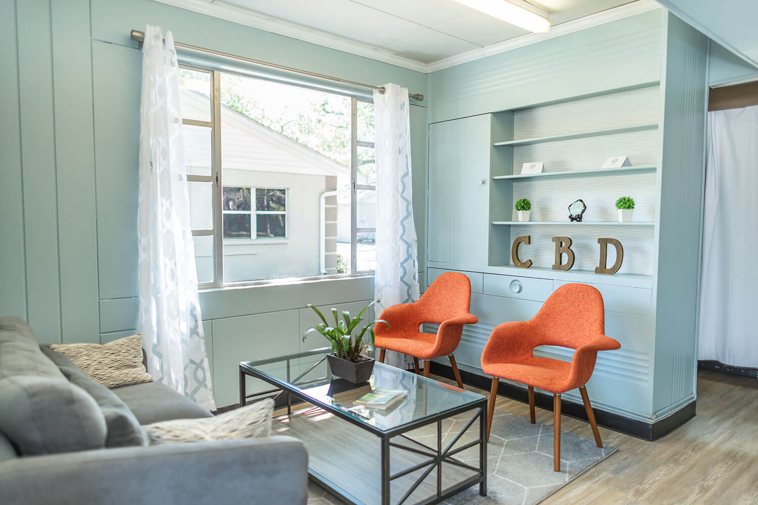 A cozy living room with two...