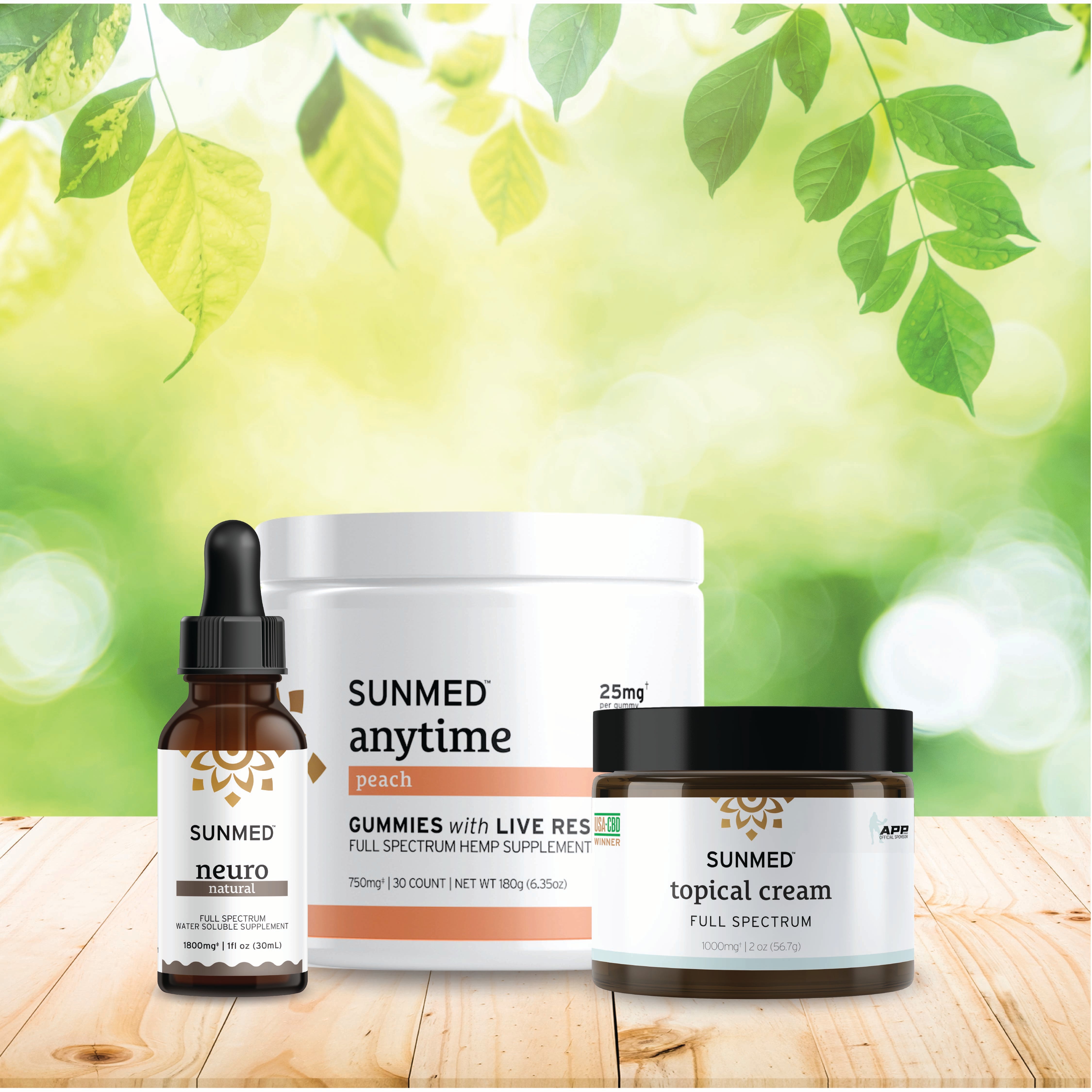 The Sunmed CBD Full Spectrum Anytime Gummies + Neuro Water Soluble + Topical Cream Bundle is displayed on a wooden surface with green leaves above.