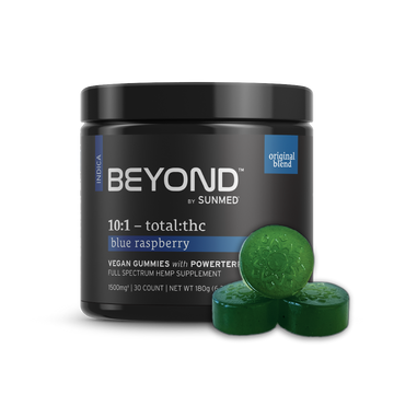A jar labeled "Beyond Indica CBD Gummies" by Sunmed CBD with three green gummies in front, crafted for soothing relaxation with full spectrum hemp extract.