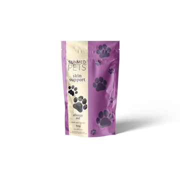 Purple pet treat bag labeled “*15% Off* - Broad Profile Allergy Aid Hemp Pet Chews” by Sunmed CBD, decorated with black paw prints.