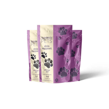 Three purple and beige pet treat bags labeled “*30% Off* - Broad Profile Allergy Aid Hemp Pet Chews 3-Pack” by Sunmed CBD, featuring black paw prints.