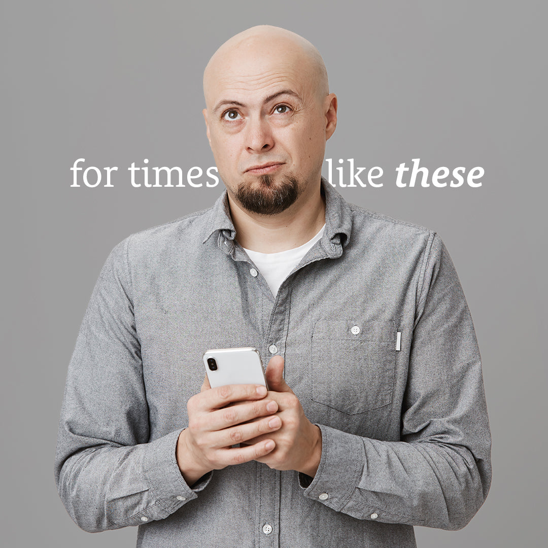 Bald man in gray shirt holding phone, looking up confused. Text: "for times like these." Try Sunmed CBD's Full Spectrum Neuro Water Soluble CBD Gummies for quick relief when you need it most.