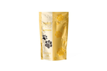 Yellow and white pet food bag labeled "Sunmed CBD Broad Spectrum Wellness CBD Pet Chews," featuring black and yellow paw prints.