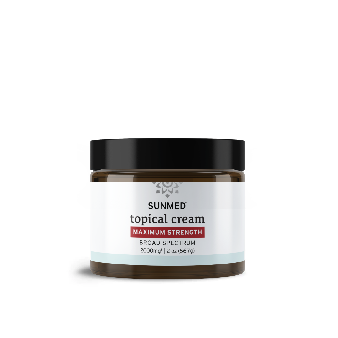 SunMed CBD Broad Spectrum Relief Cream, Maximum Strength, 2000mg in a 2 oz brown jar with a black lid. Experience natural relief with this highly effective topical formula.