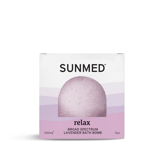 Sunmed CBD's Broad Spectrum CBD Bath Bombs, featuring 100mg and weighing 5oz, come in a white and lavender box and are infused with essential oils for a relaxing experience.