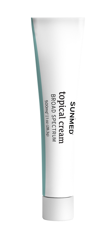 A white sample tube of Sunmed CBD Broad Spectrum Topical Cream, labeled "Broad Spectrum," contains 500mg per 1oz.