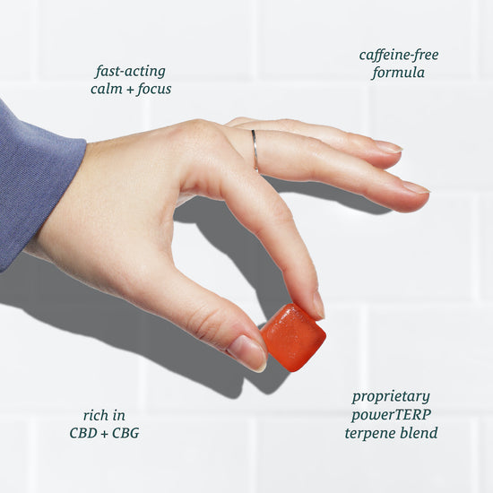 A hand holds a red gummy with text around it: 