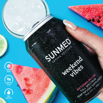 A hand holding a Sunmed CBD Beyond Weekend Vibes Sativa THC Seltzer can with watermelon slices on a blue background; labels for sugar-free, caffeine-free, low-calorie. Perfect alcohol alternative with Delta-9 THC. Comes in a 4-pack.