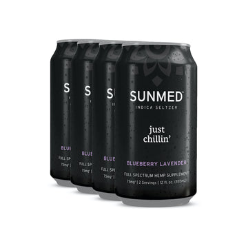 A 4-pack of Sunmed CBD Beyond Just Chillin’ Indica THC Seltzer, each 12 fl oz can infused with Blueberry Lavender hemp extract and arranged in rows, offers a perfect alcohol alternative for a calming experience.