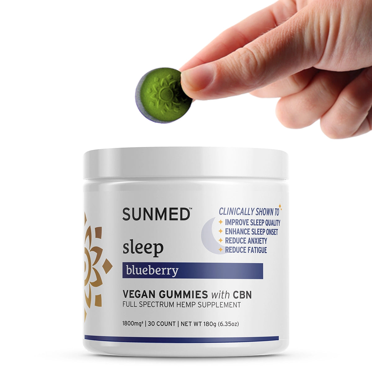 A hand holds a round, plant-based Full Spectrum Sleep CBN Gummies supplement over its jar.
