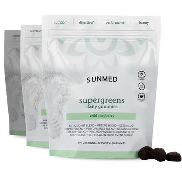 Three white pouches of Sunmed CBD *30% Off* - Supergreens Gummies 60ct 3-Pack, wild raspberry flavor, are displayed with a few gummies placed in front.