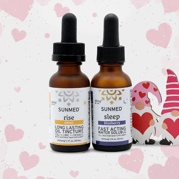 The Sunmed CBD Full Spectrum Sleep + Rise Tincture Bundle is shown with a Valentine gnome and pink heart background.