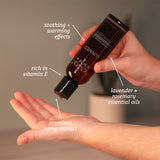 Hand applying Sunmed CBD's Broad Spectrum CBD-Infused Massage Oil, a luxurious blend featuring premium hemp extract, lavender and rosemary essential oils, and rich vitamin E for soothing effects.
